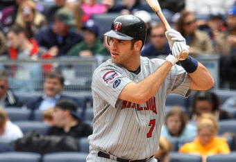 NEW YORK - MAY 17:  Joe Mauer #7 of the Minnesota Twins bats against the New York Yankees on May 17, 2009 at Yankee Stadium in the Bronx borough of New York City. The Yankees defeated the Twins 3-2 in ten innings.  (Photo by Jim McIsaac/Getty Images)