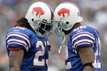 ORCHARD PARK, NY - SEPTEMBER 21:  Marshawn Lynch #23 and Fred Jackson #22 of the Buffalo Bills celebrate Lynch's first touchdown against the Oakland Raiders on September 21, 2008 at Ralph Wilson Stadium in Orchard Park, New York. Buffalo won 24-23. (Photo by Rick Stewart/Getty Images)