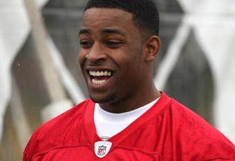 SANTA CLARA, CA - MAY 01:  Michael Crabtree #15 of the San Francisco 49ers looks on at practice during the 49ers Minicamp at their training facilities on May 1, 2009 in Santa Clara, California. Crabtree was the 49ers first round draft pick.  (Photo by Jed Jacobsohn/Getty Images)