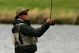 CHRISTCHURCH, NEW ZEALAND - FEBRUARY 24: An angler fishes for trout in the lake during Day 3 of the New Zealand PGA Championship at Clearwater February 24, 2007 in Christchurch, New Zealand.  (Photo by Phil Walter/Getty Images)