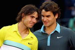 MADRID, SPAIN - MAY 17:  Roger Federer of Switzerland (R) and Rafael Nadal of Spain share a moment during the prize giving ceremony after the mens final during the Madrid Open tennis tournament at the Caja Magica on May 17, 2009 in Madrid, Spain.  (Photo by Clive Brunskill/Getty Images)