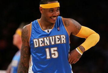 LOS ANGELES, CA - MAY 21:  Carmelo Anthony #15 of the Denver Nuggets smiles in the third quarter against the Los Angeles Lakers in Game Two of the Western Conference Finals during the 2009 NBA Playoffs at Staples Center on May 21, 2009 in Los Angeles, California. NOTE TO USER: User expressly acknowledges and agrees that, by downloading and or using this photograph, User is consenting to the terms and conditions of the Getty Images License Agreement.  (Photo by Stephen Dunn/Getty Images)