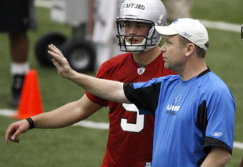 ALLEN PARK, MI - MAY 01: Offensive coordinator Scott Linehan of the Detroit Lions talks with Matthew Stafford #9 during rookie orientation camp at the Detroit Lions Headquarters and Training Facility on May 1, 2009 in Allen Park, Michigan.  (Photo by Gregory Shamus/Getty Images)