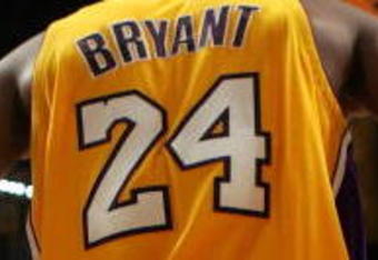 LOS ANGELES, CA - MAY 21:  Kobe Bryant #24 of the Los Angeles Lakers looks on against the Denver Nuggets in Game Two of the Western Conference Finals during the 2009 NBA Playoffs at Staples Center on May 21, 2009 in Los Angeles, California. NOTE TO USER: User expressly acknowledges and agrees that, by downloading and or using this photograph, User is consenting to the terms and conditions of the Getty Images License Agreement.  (Photo by Stephen Dunn/Getty Images)