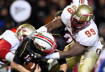 COLLEGE PARK, MD - NOVEMBER 22:  Chris Turner #10 of the Maryland Terrapins is sacked by Everette Brown #99 of the Florida State Seminoles on November 22, 2008 at Byrd Stadium in College Park, Maryland.  (Photo by Jim McIsaac/Getty Images)