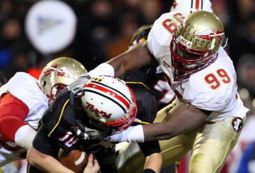 COLLEGE PARK, MD - NOVEMBER 22:  Chris Turner #10 of the Maryland Terrapins is sacked by Everette Brown #99 of the Florida State Seminoles on November 22, 2008 at Byrd Stadium in College Park, Maryland.  (Photo by Jim McIsaac/Getty Images)