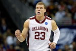 KANSAS CITY, MO - MARCH 21:  Blake Griffin #23 of the Oklahoma Sooners runs upcourt during their second round game against the Michigan Wolverines in the NCAA Division I Men's Basketball Tournament at the Sprint Center on March 21, 2009 in Kansas City, Missouri. The Sooners defeated the Wolverines 73-63.  (Photo by Jamie Squire/Getty Images)