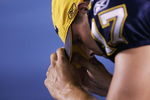 SAN DIEGO, CA -  SEPTEMBER 1:  Quarterback Philip Rivers #17 of the San Diego Chargers looks down from the bench after throwing his second interception against the San Francisco 49ers during their Pre-Season NFL Game on September 1, 2005 at Qualcomm Stadium in San Diego, California. (Photo by Donald Miralle/Getty Images)