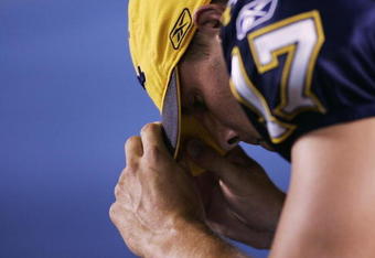 SAN DIEGO, CA -  SEPTEMBER 1:  Quarterback Philip Rivers #17 of the San Diego Chargers looks down from the bench after throwing his second interception against the San Francisco 49ers during their Pre-Season NFL Game on September 1, 2005 at Qualcomm Stadium in San Diego, California. (Photo by Donald Miralle/Getty Images)