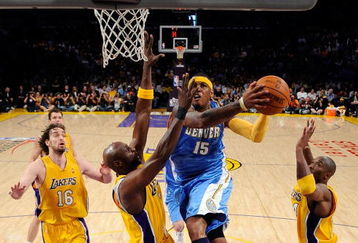 LOS ANGELES, CA - MAY 21:  Carmelo Anthony #15 of the Denver Nuggets goes for a shot between Lamar Odom #7 and Kobe Bryant #24 of the Los Angeles Lakers in the first half in Game Two of the Western Conference Finals during the 2009 NBA Playoffs at Staples Center on May 21, 2009 in Los Angeles, California. NOTE TO USER: User expressly acknowledges and agrees that, by downloading and or using this photograph, User is consenting to the terms and conditions of the Getty Images License Agreement.  (Photo by Kevork Djansezian/Getty Images)