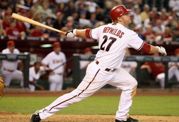 PHOENIX - APRIL 22:  Mark Reynolds #27 of the Arizona Diamondbacks bats against the Colorado Rockies during the game at Chase Field on April 22, 2009 in Phoenix, Arizona. The Diamondbacks defeated the Rockies 2-0.  (Photo by Christian Petersen/Getty Images)