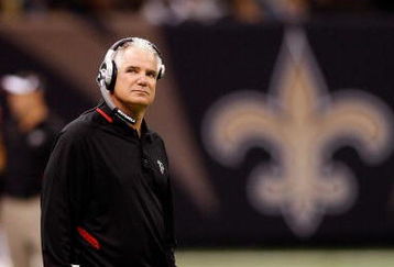 NEW ORLEANS - DECEMBER 07:  Head coach Mike Smith of the Atlanta Falcons looks on against the New Orleans Saints on December 7, 2008 at the Superdome in New Orleans, Louisiana.   The Saints defeated the Falcons 29-25.  (Photo by Chris Graythen/Getty Images)