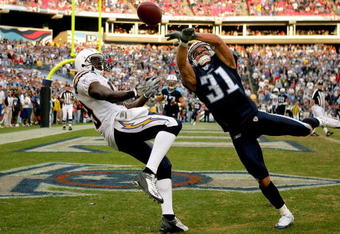 NASHVILLE, TN - DECEMBER 9:  Cortland Finnegan #31 of the Tennessee Titans breaks up a pass to Chris Chambers #89 of the San Diego Chargers at LP Field December 9, 2007 in Nashville, Tennessee.  (Photo by Matthew Stockman/Getty Images)