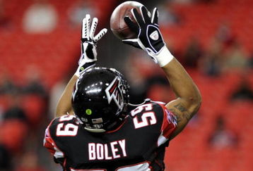 ATLANTA - DECEMBER 14: Linebacker Michael Boley #59 of the Atlanta Falcons grabs a warm-up pass before play against the Tampa Bay Buccaneers  at the Georgia Dome on December 14, 2008 in Atlanta, Georgia.  (Photo by Al Messerschmidt/Getty Images) 