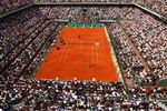 PARIS - JUNE 08:  A general view of Court Philippe Chatrier as Rafael Nadal of Spain celebrates winning matchpoint during the Men's Singles Final match against Roger Federer of Switzerland on day fifteen of the French Open at Roland Garros on June 8, 2008 in Paris, France.  (Photo by Mike Hewitt/Getty Images)