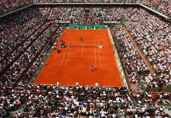 PARIS - JUNE 08:  A general view of Court Philippe Chatrier as Rafael Nadal of Spain celebrates winning matchpoint during the Men's Singles Final match against Roger Federer of Switzerland on day fifteen of the French Open at Roland Garros on June 8, 2008 in Paris, France.  (Photo by Mike Hewitt/Getty Images)
