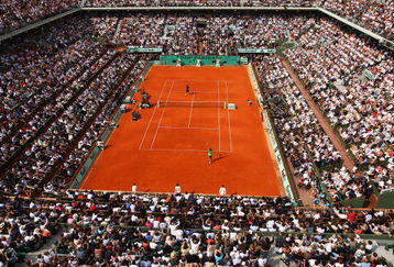 PARIS - JUNE 08:  A general view of Court Philippe Chatrier as Rafael Nadal of Spain celebrates winning matchpoint during the Men's Singles Final match against Roger Federer of Switzerland on day fifteen of the French Open at Roland Garros on June 8, 2008 in Paris, France.  (Photo by Mike Hewitt/Getty Images)