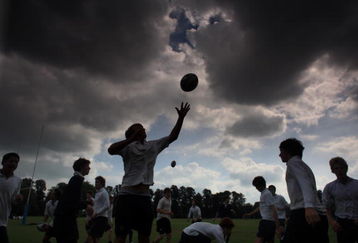 ETON, ENGLAND - SEPTEMBER 7: Boys of Eton College take part in a rugby training session under a brooding sky on September 7, 2007 in Eton, England. An icon amongst private schools, since its founding in 1440 by King Henry VI, Eton has educated 18 British Prime Ministers, as well as prominent authors, artists and members of royal families from around the world. The school caters for some 1300 pupils divided into 25 houses each one overseen by a housemaster chosen from the senior ranks of the staff which number around 160.  (Photo by Christopher Furlong/Getty Images)