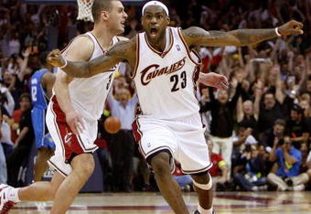 CLEVELAND - MAY 22:  LeBron James #23 and Sasha Pavlovic #3 of the Cleveland Cavaliers celebrate after James made the game winning three pointer against the Orlando Magic in Game Two of the Eastern Conference Finals during the 2009 Playoffs at Quicken Loans Arena on May 22, 2009 in Cleveland, Ohio. NOTE TO USER: User expressly acknowledges and agrees that, by downloading and or using this photograph, User is consenting to the terms and conditions of the Getty Images License Agreement  (Photo by Gregory Shamus/Getty Images)