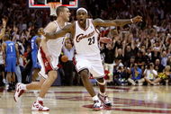 CLEVELAND - MAY 22:  LeBron James #23 and Sasha Pavlovic #3 of the Cleveland Cavaliers celebrate after James made the game winning three pointer against the Orlando Magic in Game Two of the Eastern Conference Finals during the 2009 Playoffs at Quicken Loans Arena on May 22, 2009 in Cleveland, Ohio. NOTE TO USER: User expressly acknowledges and agrees that, by downloading and or using this photograph, User is consenting to the terms and conditions of the Getty Images License Agreement  (Photo by Gregory Shamus/Getty Images)