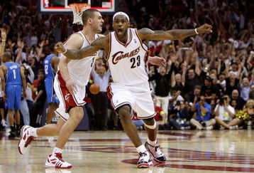 CLEVELAND - MAY 22:  LeBron James #23 and Sasha Pavlovic #3 of the Cleveland Cavaliers celebrate after James made the game winning three pointer against the Orlando Magic in Game Two of the Eastern Conference Finals during the 2009 Playoffs at Quicken Loans Arena on May 22, 2009 in Cleveland, Ohio. NOTE TO USER: User expressly acknowledges and agrees that, by downloading and or using this photograph, User is consenting to the terms and conditions of the Getty Images License Agreement  (Photo by Gregory Shamus/Getty Images)