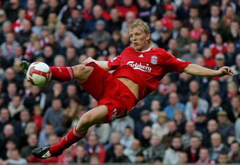 LIVERPOOL, UNITED KINGDOM - OCTOBER 18: Liverpool striker Dirk Kuyt scores the third Liverpool goal during the Barclays Premier League match between Liverpool and Wigan Athletic at Anfield on October 18, 2008 in Liverpool, England.  (Photo by Stu Forster/Getty Images)
