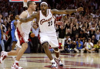 CLEVELAND - MAY 22:  LeBron James #23 and Sasha Pavlovic #3 of the Cleveland Cavaliers celebrate after James made the game winning three pointer against the Orlando Magic in Game Two of the Eastern Conference Finals during the 2009 Playoffs at Quicken Loans Arena on May 22, 2009 in Cleveland, Ohio. NOTE TO USER: User expressly acknowledges and agrees that, by downloading and or using this photograph, User is consenting to the terms and conditions of the Getty Images License Agreement  (Photo by Gregory Shamus/Getty Images)