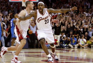 CLEVELAND - MAY 22:  LeBron James #23 and Sasha Pavlovic #3 of the Cleveland Cavaliers celebrate after James made the game winning three pointer against the Orlando Magic in Game Two of the Eastern Conference Finals during the 2009 Playoffs at Quicken Loans Arena on May 22, 2009 in Cleveland, Ohio. NOTE TO USER: User expressly acknowledges and agrees that, by downloading and or using this photograph, User is consenting to the terms and conditions of the Getty Images License Agreement  (Photo by Gregory Shamus/Getty Images)