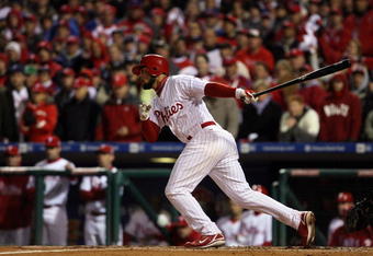 PHILADELPHIA - OCTOBER 29:  Pedro Feliz #7 of the Philadelphia Phillies hits a RBI single to score Eric Bruntlett in the bottom of the seventh inning against the Tampa Bay Rays during the continuation of game five of the 2008 MLB World Series on October 29, 2008 at Citizens Bank Park in Philadelphia, Pennsylvania.  (Photo by Doug Pensinger/Getty Images)