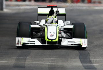 MONTE CARLO, MONACO - MAY 23:  Jenson Button of Great Britain and Brawn GP celebrates after taking pole position during qualifying for the Monaco Formula One Grand Prix at the Monte Carlo Circuit on May 23, 2009 in Monte Carlo, Monaco.  (Photo by Clive Mason/Getty Images)