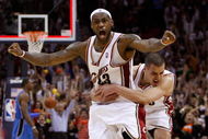 CLEVELAND - MAY 22:  LeBron James #23 and Sasha Pavlovic #3 of the Cleveland Cavaliers celebrate after James made the game winning three pointer against the Orlando Magic in Game Two of the Eastern Conference Finals during the 2009 Playoffs at Quicken Loans Arena on May 22, 2009 in Cleveland, Ohio. NOTE TO USER: User expressly acknowledges and agrees that, by downloading and or using this photograph, User is consenting to the terms and conditions of the Getty Images License Agreement  (Photo by Gregory Shamus/Getty Images)