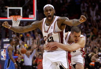 CLEVELAND - MAY 22:  LeBron James #23 and Sasha Pavlovic #3 of the Cleveland Cavaliers celebrate after James made the game winning three pointer against the Orlando Magic in Game Two of the Eastern Conference Finals during the 2009 Playoffs at Quicken Loans Arena on May 22, 2009 in Cleveland, Ohio. NOTE TO USER: User expressly acknowledges and agrees that, by downloading and or using this photograph, User is consenting to the terms and conditions of the Getty Images License Agreement  (Photo by Gregory Shamus/Getty Images)