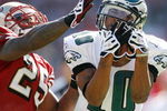 SAN FRANCISCO - OCTOBER 12:  Wide receiver DeSean Jackson #10 of the Philadelphia Eagles catches a 27-yard pass in front of defensive back Tarell Brown #25 of the San Francisco 49ers during their game on October 12, 2008 at Candlestick Park in San Francisco, California. Philadelphia won 40-26.  (Photo by Greg Trott/Getty Images)