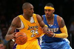 LOS ANGELES, CA - MAY 21:  Kobe Bryant #24 of the Los Angeles Lakers posts up Carmelo Anthony #15 of the Denver Nuggets in Game Two of the Western Conference Finals during the 2009 NBA Playoffs at Staples Center on May 21, 2009 in Los Angeles, California. NOTE TO USER: User expressly acknowledges and agrees that, by downloading and or using this photograph, User is consenting to the terms and conditions of the Getty Images License Agreement.  (Photo by Stephen Dunn/Getty Images)