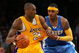 LOS ANGELES, CA - MAY 21:  Kobe Bryant #24 of the Los Angeles Lakers posts up Carmelo Anthony #15 of the Denver Nuggets in Game Two of the Western Conference Finals during the 2009 NBA Playoffs at Staples Center on May 21, 2009 in Los Angeles, California. NOTE TO USER: User expressly acknowledges and agrees that, by downloading and or using this photograph, User is consenting to the terms and conditions of the Getty Images License Agreement.  (Photo by Stephen Dunn/Getty Images)
