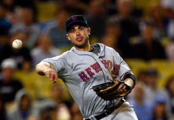 LOS ANGELES, CA - MAY 19:  Third baseman David Wright #5 of the New York Mets throws to first base to get Casey Blake of the Los Angeles Dodgers out in the eighth inning at Dodger Stadium on May 19, 2009 in Los Angeles, California. The Dodgers defeated the Mets 5-3.  (Photo by Jeff Gross/Getty Images)