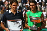PARIS - JUNE 08:  Roger Federer (L) of Switzerland and Rafael Nadal of Spain with their trophies after the Men's Singles Final match on day fifteen of the French Open at Roland Garros on June 8, 2008 in Paris, France.  (Photo by Julian Finney/Getty Images)