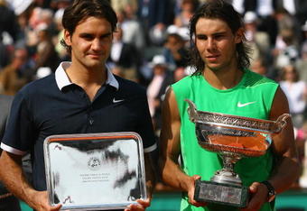 PARIS - JUNE 08:  Roger Federer (L) of Switzerland and Rafael Nadal of Spain with their trophies after the Men's Singles Final match on day fifteen of the French Open at Roland Garros on June 8, 2008 in Paris, France.  (Photo by Julian Finney/Getty Images)