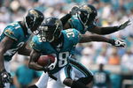 JACKSONVILLE, FL - SEPTEMBER 14:  Punt returner Brian Witherspoon #38 of the Jacksonville Jaguars looks for room to run while taking on the Buffalo Bills at Jacksonville Municipal Stadium on September 14, 2008 in Jacksonville, Florida.  (Photo by Doug Benc/Getty Images)