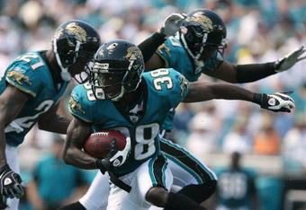 JACKSONVILLE, FL - SEPTEMBER 14:  Punt returner Brian Witherspoon #38 of the Jacksonville Jaguars looks for room to run while taking on the Buffalo Bills at Jacksonville Municipal Stadium on September 14, 2008 in Jacksonville, Florida.  (Photo by Doug Benc/Getty Images)