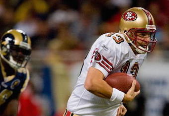 ST. LOUIS, MO - DECEMBER 21:  Shaun Hill #13 of the San Francisco 49ers runs with the ball during the game against the St. Louis Rams at the Edward Jones Dome on December 21, 2008 in St. Louis, Missouri. The 49ers won 17-16. (Photo by Dilip Vishwanat/Getty Images) 