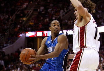 CLEVELAND - MAY 22:  Rafer Alston #1 of the Orlando Magic handles the ball against Anderson Varejao #17 of the Cleveland Cavaliers in Game Two of the Eastern Conference Finals during the 2009 Playoffs at Quicken Loans Arena on May 22, 2009 in Cleveland, Ohio. NOTE TO USER: User expressly acknowledges and agrees that, by downloading and or using this photograph, User is consenting to the terms and conditions of the Getty Images License Agreement  (Photo by Gregory Shamus/Getty Images)