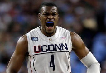 DETROIT - APRIL 04:  Jeff Adrien #4 of the Connecticut Huskies reacts in the first half while taking on the Michigan State Spartans during the National Semifinal game of the NCAA Division I Men's Basketball Championship at Ford Field on April 4, 2009 in Detroit, Michigan.  (Photo by Andy Lyons/Getty Images)