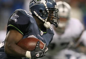 SEATTLE - AUGUST 29:  Running back Justin Forsett #30 of the Seattle Seahawks rushes against the Oakland Raiders at Qwest Field on August 29, 2008 in Seattle, Washington. The Seahawks defeated the Raiders 23-16. (Photo by Otto Greule Jr/Getty Images)
