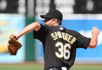 OAKLAND, CA - APRIL 12:  Russ Springer #36 of the Oakland Athletics pitches against the Seattle Mariners during a Major League Baseball game on April 12, 2009 at the Oakland Coliseum in Oakland, California.  (Photo by Jed Jacobsohn/Getty Images)