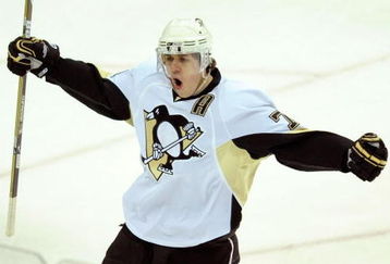 RALEIGH, NC - MAY 23:  Evgeni Malkin #71 of the Pittsburgh Penguins reacts after scoring a goal against the Carolina Hurricanes during Game Three of the Eastern Conference Championship Round of the 2009 Stanley Cup Playoffs at RBC Center on May 23, 2009 in Raleigh, North Carolina.  (Photo by Grant Halverson/Getty Images)