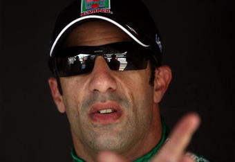 INDIANAPOLIS - MAY 22:  Tony Kanaan, driver of the #11 Team 7-Eleven Andretti Green Racing, looks on from the pits, during Miller Lite Carb Day practice for the IRL IndyCar Series 93rd running of the Indianapolis 500 on May 22, 2009 at the Indianapolis Motor Speedway in Indianapolis, Indiana.  (Photo by Donald Miralle/Getty Images)