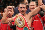LAS VEGAS - NOVEMBER 27:  Rafael Marquez celebrates after defeating Mauricio Pastrana for the IBF World Bantamweight Championship at the MGM Grand Garden Arena on November 27, 2004 in Las Vegas, Nevada. Marquez defeated Pastrana by TKO after the 8th round.   (Photo by Al Bello/Getty Images)