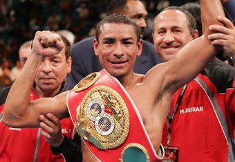 LAS VEGAS - NOVEMBER 27:  Rafael Marquez celebrates after defeating Mauricio Pastrana for the IBF World Bantamweight Championship at the MGM Grand Garden Arena on November 27, 2004 in Las Vegas, Nevada. Marquez defeated Pastrana by TKO after the 8th round.   (Photo by Al Bello/Getty Images)