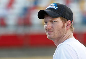 CONCORD, NC - MAY 21:  Dale Earnhardt Jr., driver of the #88 National Guard/AMP Energy Chevrolet, stands on pit road during qualifying for the NASCAR Sprint Cup Series Coca-Cola 600 on May 21, 2009 at Lowe's Motor Speedway in Concord, North Carolina.  (Photo by Geoff Burke/Getty Images)